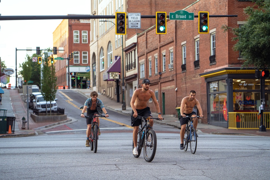 Bikers coming down the road in downtown Athens.